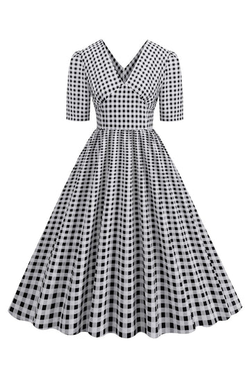 Vestido negro con cuello en V con cuello en V de la década de 1950